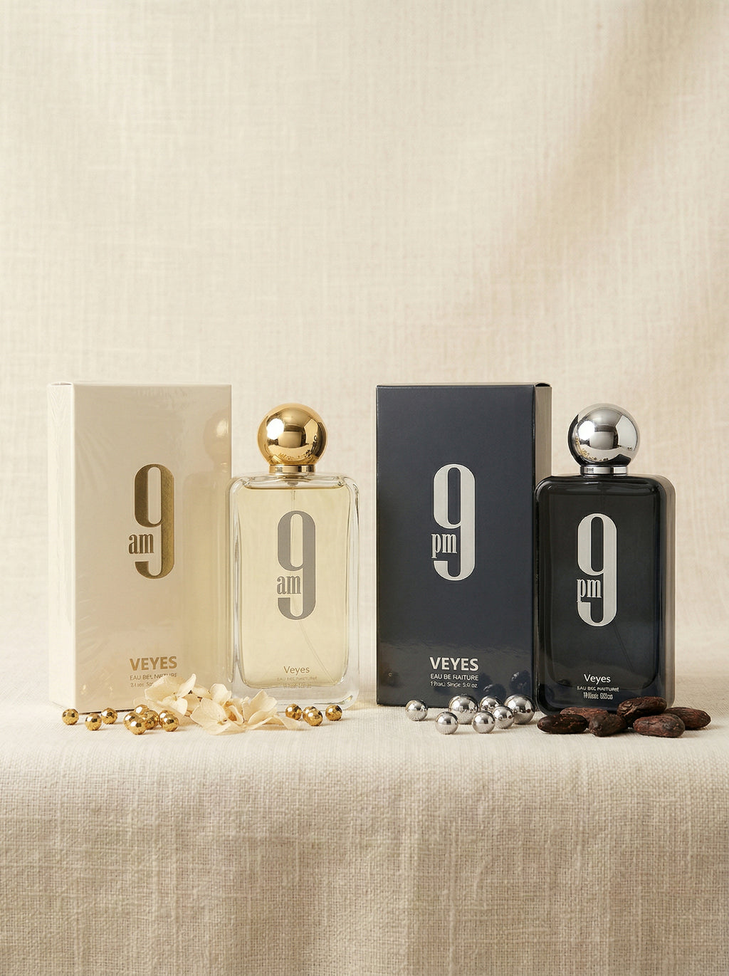 Two Veyes perfume bottles, one labeled '9 am' and the other '9 pm', on a beige surface.